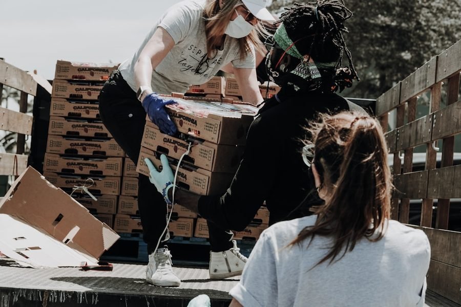 Volunteers sharing food at a Humans of Valor community drive